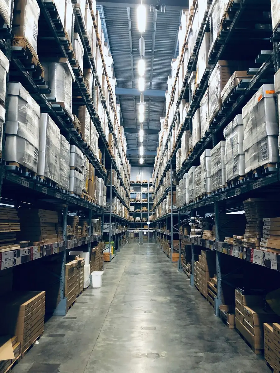 Parcels moving along a sorting conveyor in a fulfilment centre
